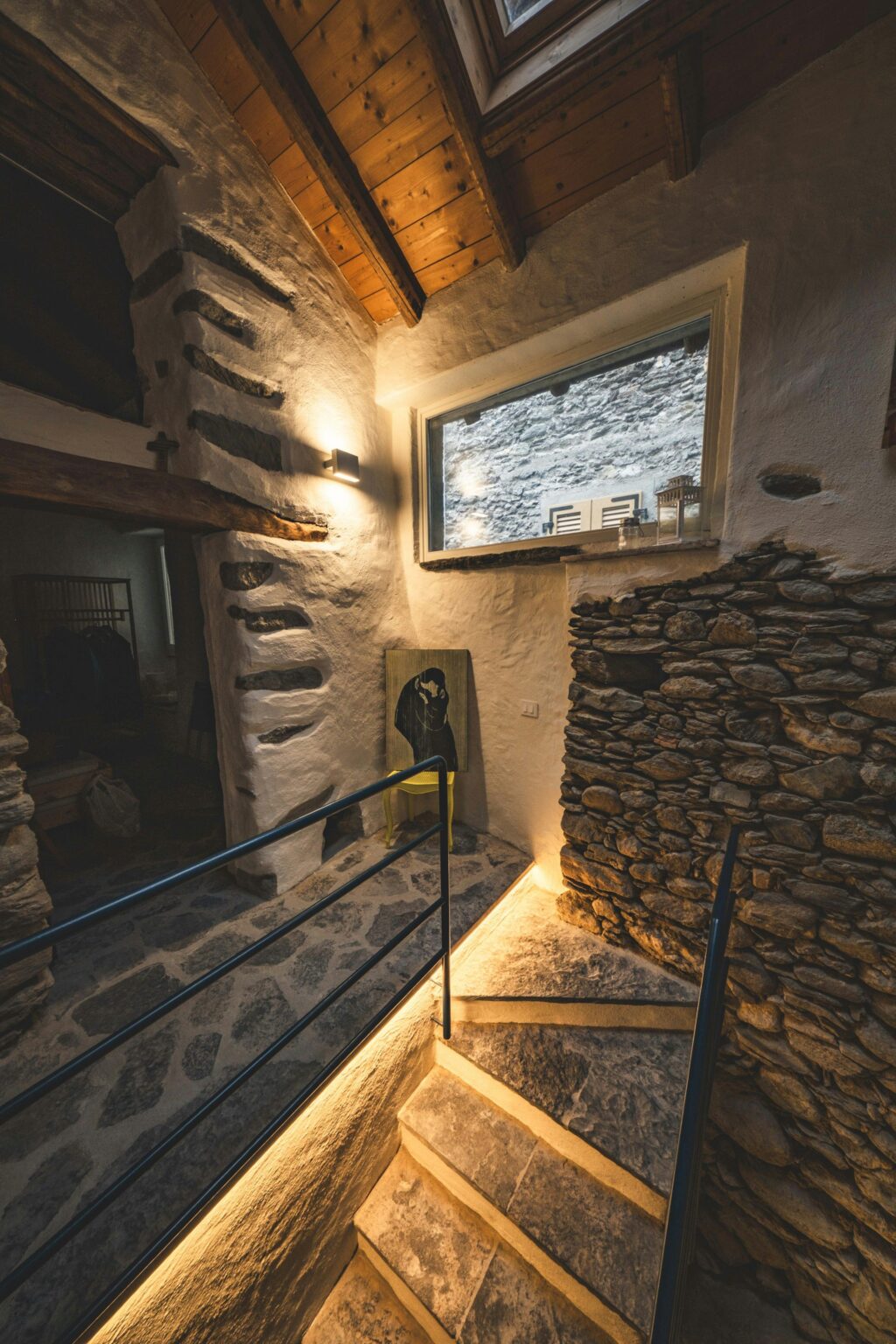 A room with stone accent walls