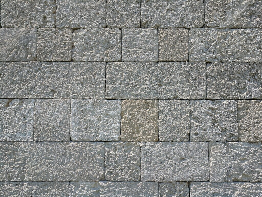 Very precisely installed greyish stone veneer on a wall