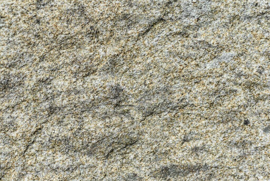A close-up of a piece of natural stone - quartzite